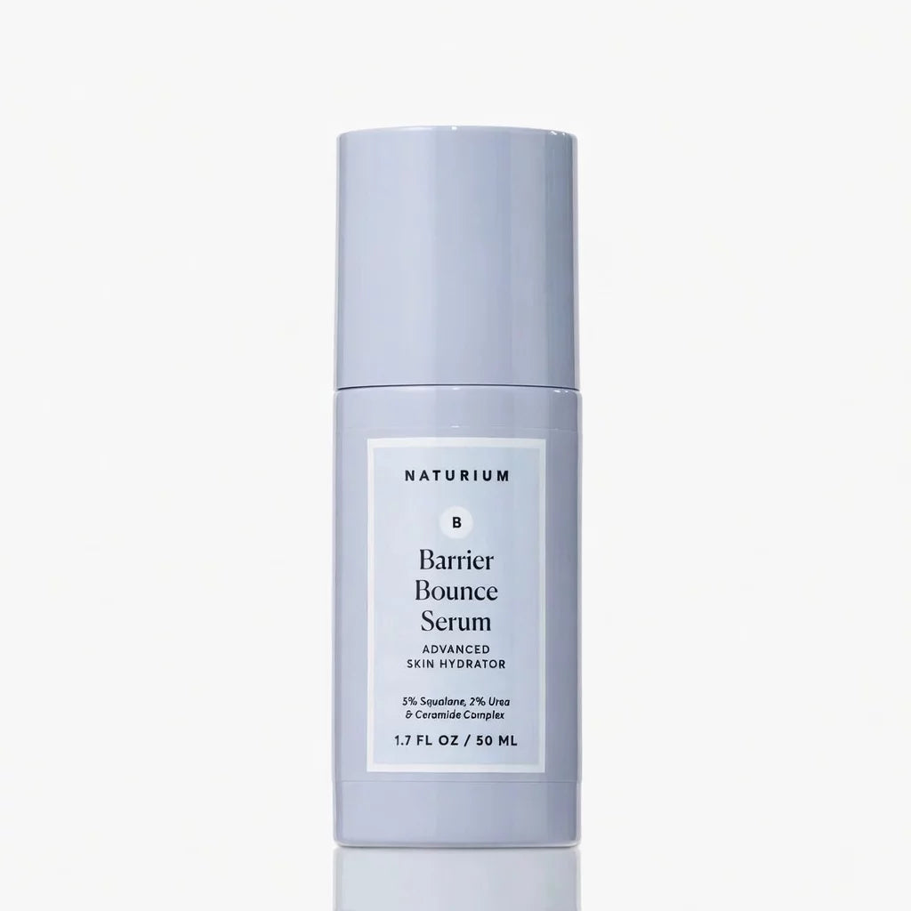 Naturium Barrier Bounce Serum 50ml lavender pump bottle — advanced skin hydrator with 5% Squalane, 2% Urea and Ceramide Complex for deep hydration, barrier repair and bouncy skin