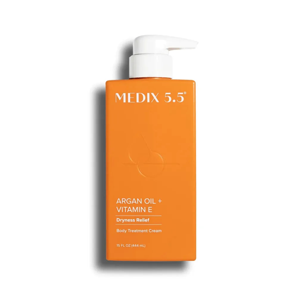 Medix 5.5 Argan Oil + Vitamin E Body Treatment Cream 444ml orange pump bottle — pH-balanced intensive dryness relief body cream with Argan Oil and Vitamin E for soft, nourished skin