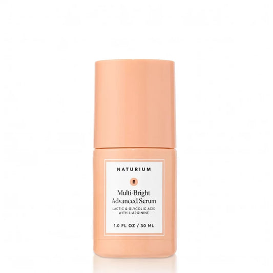 Naturium Multi-Bright Advanced Serum 30ml peach pump bottle — dual-AHA brightening serum with Lactic Acid, Glycolic Acid and L-Arginine for resurfaced, even-toned and radiant skin
