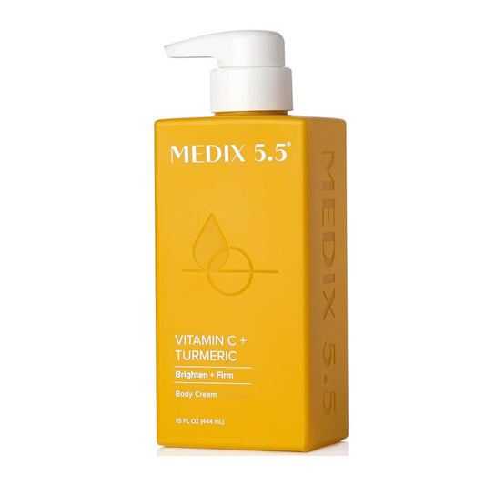 Medix 5.5 Vitamin C + Turmeric Body Cream 444ml golden yellow pump bottle — pH-balanced brightening body cream with Vitamin C and Turmeric to brighten, even skin tone and firm body skin